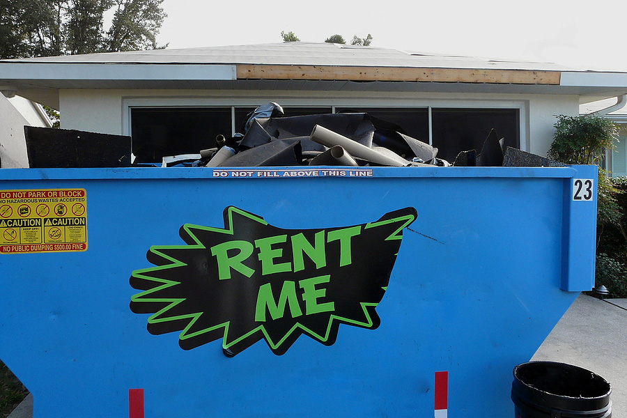 https://www.gulfcoastcans.com/wp-content/uploads/2021/10/Construction-Dumpster-For-Rent-1.jpg