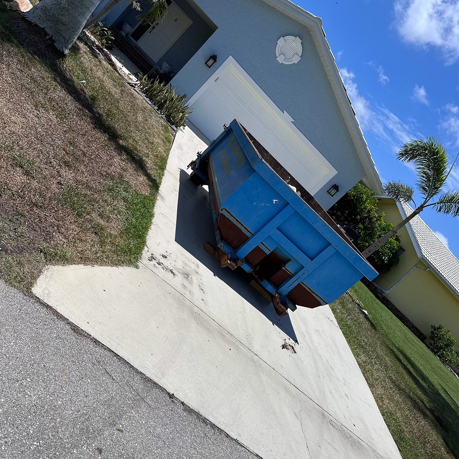 Dumpster In Driveway